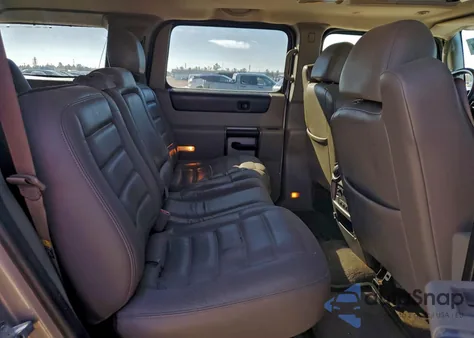 2004 Hummer H2 z USA, uszkodzony, nr VIN 5GRGN23U54H111112